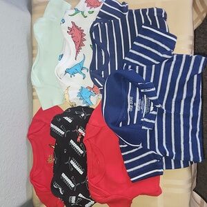 Various Brands Of Baby Onesies